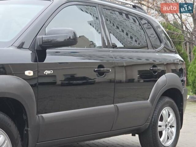 Чорний Хендай Туксон, об'ємом двигуна 1.98 л та пробігом 123 тис. км за 7950 $, фото 17 на Automoto.ua