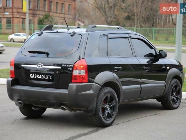 Черный Хендай Туксон, объемом двигателя 2.66 л и пробегом 217 тыс. км за 8600 $, фото 5 на Automoto.ua