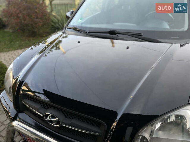 Чорний Хендай Туксон, об'ємом двигуна 1.98 л та пробігом 233 тис. км за 7650 $, фото 21 на Automoto.ua