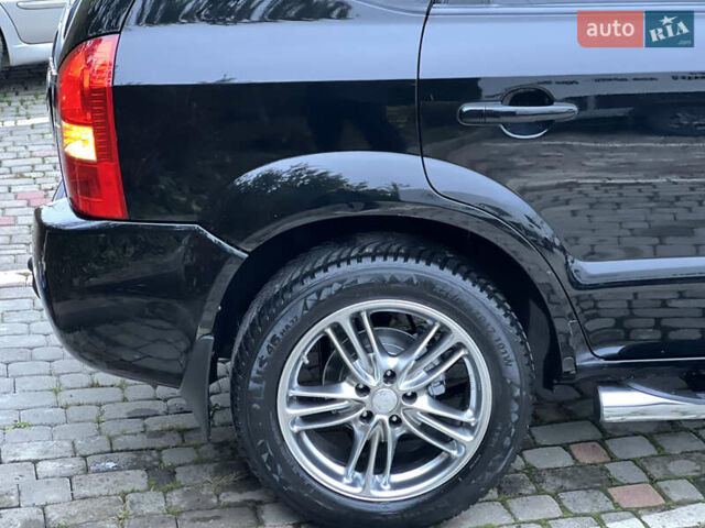 Чорний Хендай Туксон, об'ємом двигуна 1.98 л та пробігом 170 тис. км за 6999 $, фото 16 на Automoto.ua