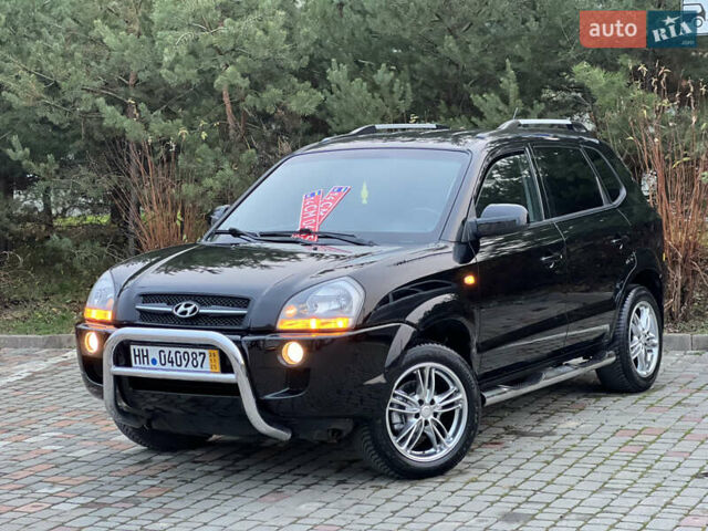 Чорний Хендай Туксон, об'ємом двигуна 1.98 л та пробігом 170 тис. км за 6999 $, фото 2 на Automoto.ua