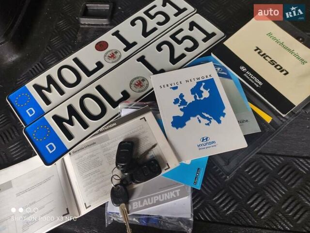 Черный Хендай Туксон, объемом двигателя 2 л и пробегом 237 тыс. км за 7999 $, фото 25 на Automoto.ua