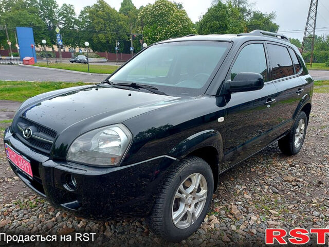 Черный Хендай Туксон, объемом двигателя 2 л и пробегом 130 тыс. км за 7200 $, фото 5 на Automoto.ua