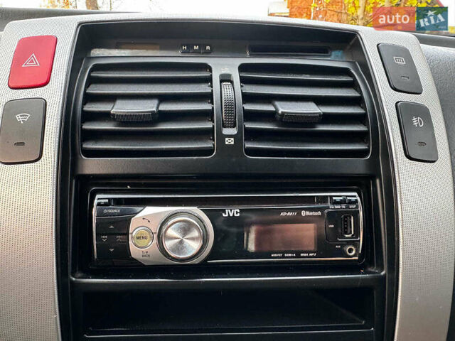 Черный Хендай Туксон, объемом двигателя 2 л и пробегом 210 тыс. км за 7990 $, фото 18 на Automoto.ua