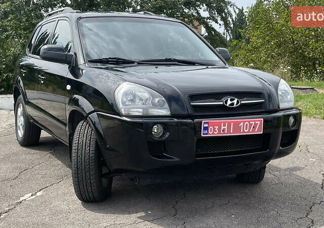 Черный Хендай Туксон, объемом двигателя 2 л и пробегом 236 тыс. км за 6950 $, фото 7 на Automoto.ua