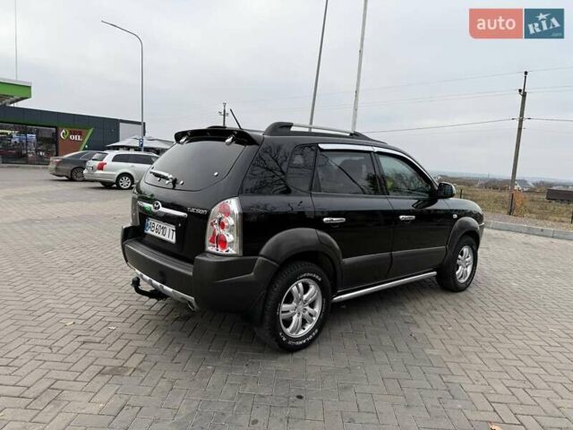 Чорний Хендай Туксон, об'ємом двигуна 2 л та пробігом 124 тис. км за 7950 $, фото 20 на Automoto.ua
