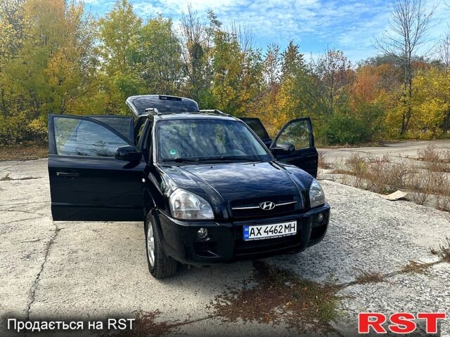 Черный Хендай Туксон, объемом двигателя 2 л и пробегом 250 тыс. км за 7500 $, фото 1 на Automoto.ua