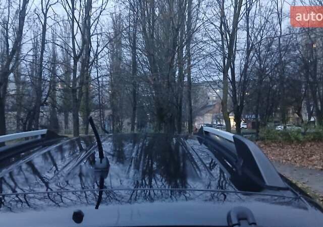 Черный Хендай Туксон, объемом двигателя 1.98 л и пробегом 320 тыс. км за 6300 $, фото 16 на Automoto.ua