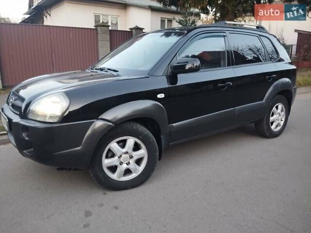 Чорний Хендай Туксон, об'ємом двигуна 1.99 л та пробігом 239 тис. км за 6990 $, фото 1 на Automoto.ua