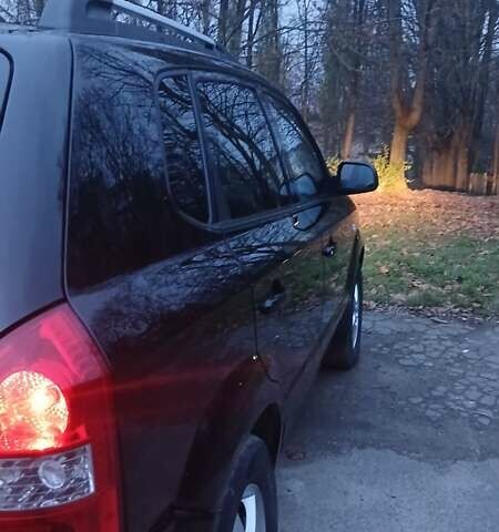 Черный Хендай Туксон, объемом двигателя 1.98 л и пробегом 320 тыс. км за 6300 $, фото 6 на Automoto.ua