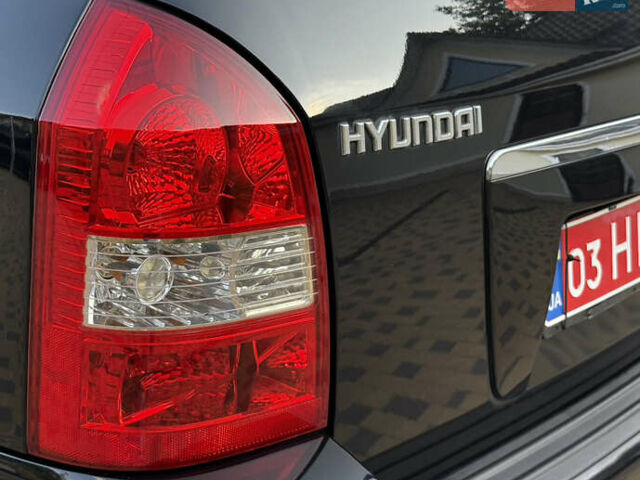 Чорний Хендай Туксон, об'ємом двигуна 1.98 л та пробігом 212 тис. км за 8200 $, фото 38 на Automoto.ua
