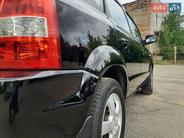 Черный Хендай Туксон, объемом двигателя 2 л и пробегом 216 тыс. км за 7600 $, фото 16 на Automoto.ua