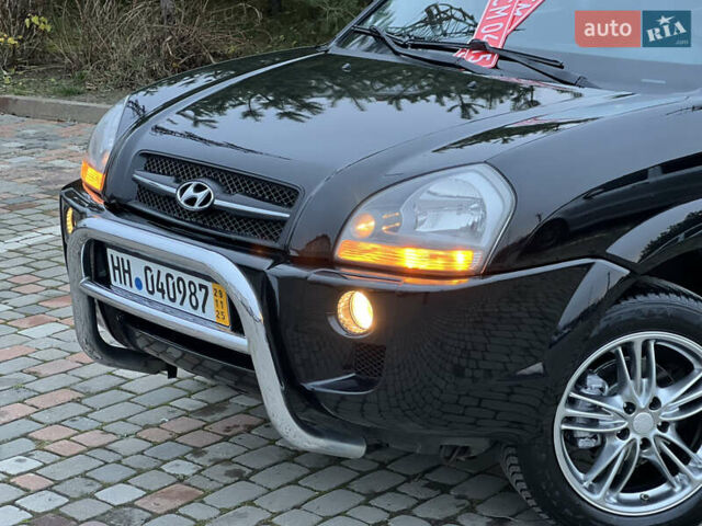 Чорний Хендай Туксон, об'ємом двигуна 1.98 л та пробігом 170 тис. км за 6999 $, фото 8 на Automoto.ua