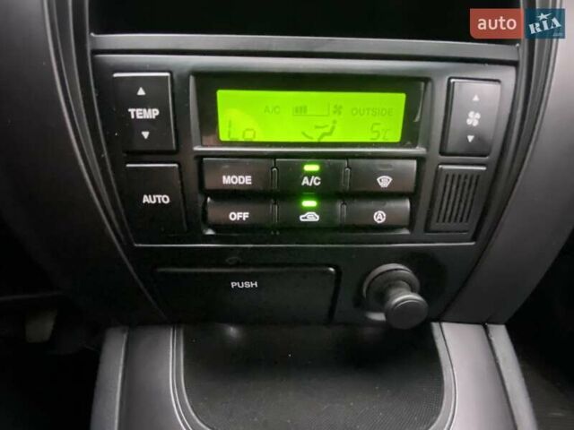 Чорний Хендай Туксон, об'ємом двигуна 1.98 л та пробігом 202 тис. км за 7350 $, фото 23 на Automoto.ua