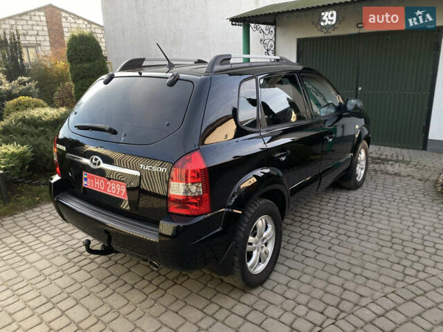 Чорний Хендай Туксон, об'ємом двигуна 1.98 л та пробігом 233 тис. км за 7650 $, фото 4 на Automoto.ua