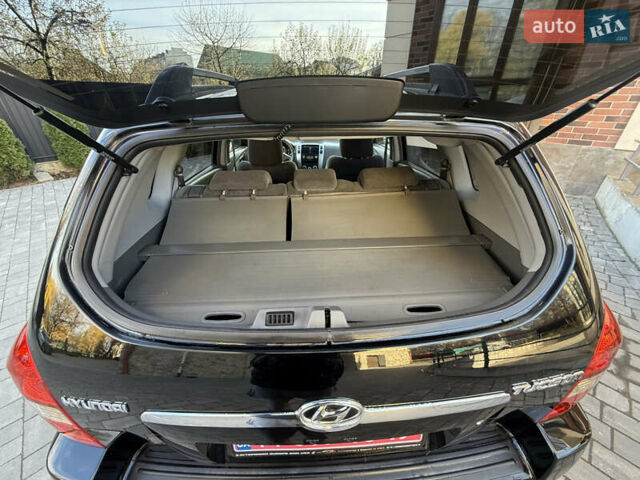 Черный Хендай Туксон, объемом двигателя 2 л и пробегом 249 тыс. км за 7450 $, фото 27 на Automoto.ua