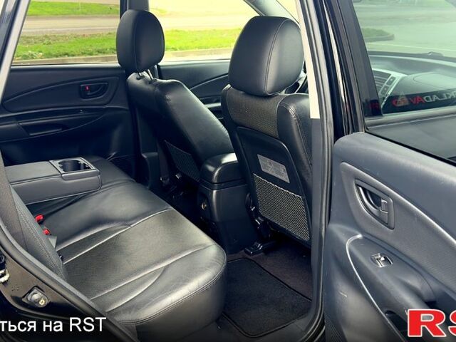 Черный Хендай Туксон, объемом двигателя 2 л и пробегом 200 тыс. км за 7800 $, фото 9 на Automoto.ua