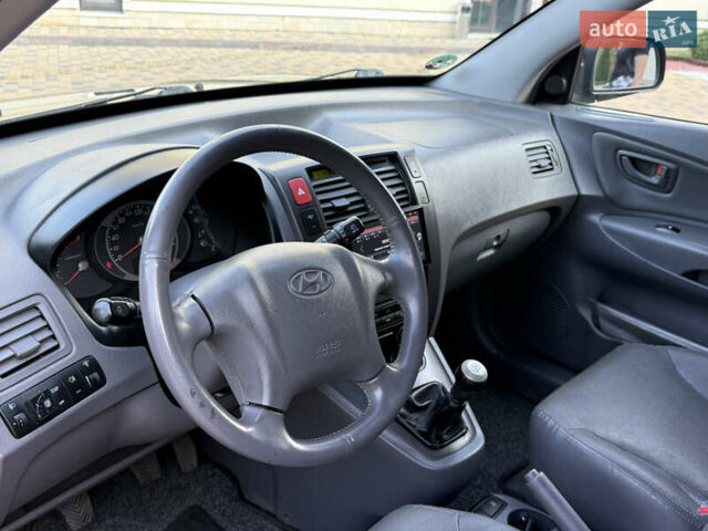 Чорний Хендай Туксон, об'ємом двигуна 1.98 л та пробігом 212 тис. км за 8200 $, фото 75 на Automoto.ua