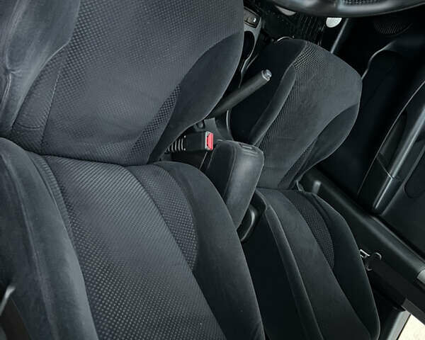 Черный Хендай Туксон, объемом двигателя 1.98 л и пробегом 227 тыс. км за 6900 $, фото 20 на Automoto.ua