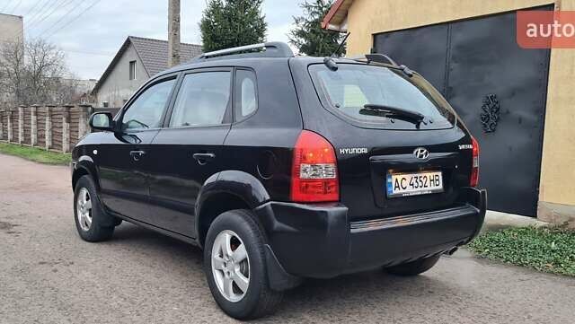 Черный Хендай Туксон, объемом двигателя 1.98 л и пробегом 277 тыс. км за 5350 $, фото 24 на Automoto.ua