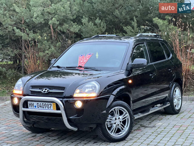 Чорний Хендай Туксон, об'ємом двигуна 1.98 л та пробігом 170 тис. км за 6999 $, фото 7 на Automoto.ua