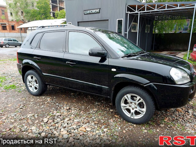 Черный Хендай Туксон, объемом двигателя 2 л и пробегом 130 тыс. км за 7200 $, фото 3 на Automoto.ua