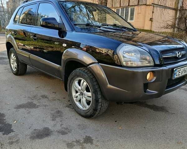 Черный Хендай Туксон, объемом двигателя 1.98 л и пробегом 256 тыс. км за 8000 $, фото 17 на Automoto.ua