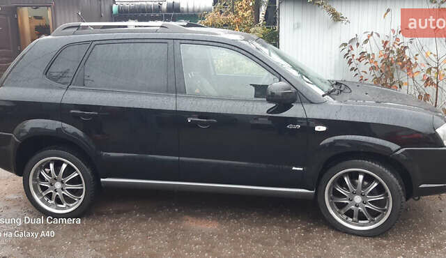 Чорний Хендай Туксон, об'ємом двигуна 1.99 л та пробігом 243 тис. км за 8850 $, фото 5 на Automoto.ua