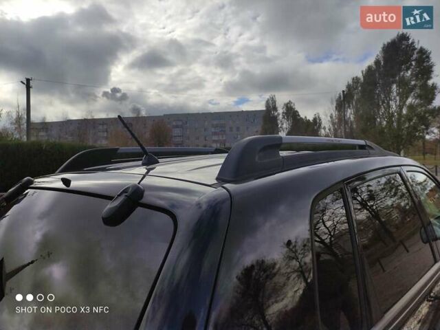 Черный Хендай Туксон, объемом двигателя 2 л и пробегом 237 тыс. км за 7999 $, фото 41 на Automoto.ua