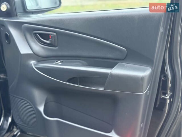 Черный Хендай Туксон, объемом двигателя 1.98 л и пробегом 231 тыс. км за 7750 $, фото 22 на Automoto.ua