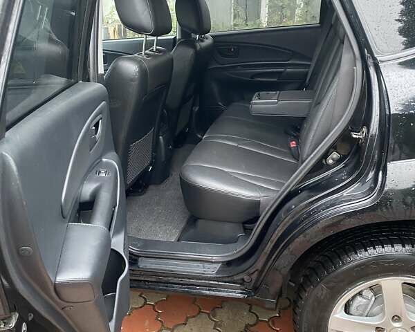 Чорний Хендай Туксон, об'ємом двигуна 1.98 л та пробігом 202 тис. км за 7350 $, фото 14 на Automoto.ua