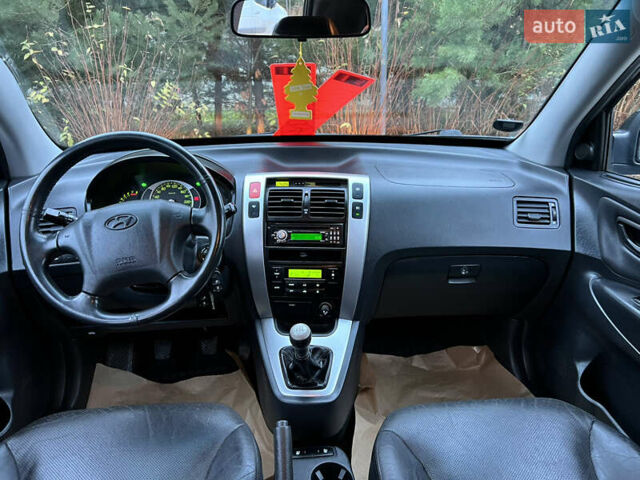 Чорний Хендай Туксон, об'ємом двигуна 1.98 л та пробігом 170 тис. км за 6999 $, фото 54 на Automoto.ua