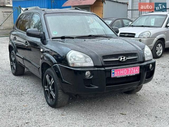 Чорний Хендай Туксон, об'ємом двигуна 2 л та пробігом 167 тис. км за 7950 $, фото 2 на Automoto.ua