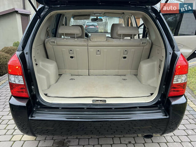 Чорний Хендай Туксон, об'ємом двигуна 1.98 л та пробігом 185 тис. км за 6850 $, фото 12 на Automoto.ua