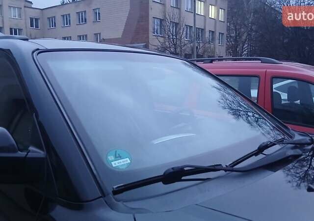 Черный Хендай Туксон, объемом двигателя 1.98 л и пробегом 320 тыс. км за 6300 $, фото 8 на Automoto.ua