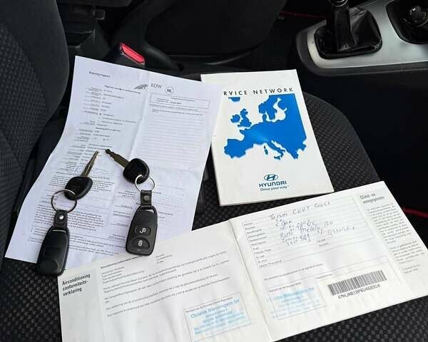 Чорний Хендай Туксон, об'ємом двигуна 2 л та пробігом 124 тис. км за 7950 $, фото 25 на Automoto.ua