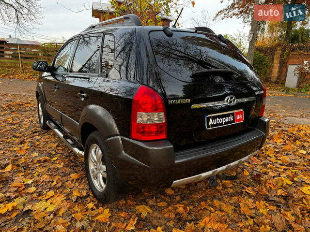 Черный Хендай Туксон, объемом двигателя 2 л и пробегом 210 тыс. км за 7990 $, фото 7 на Automoto.ua
