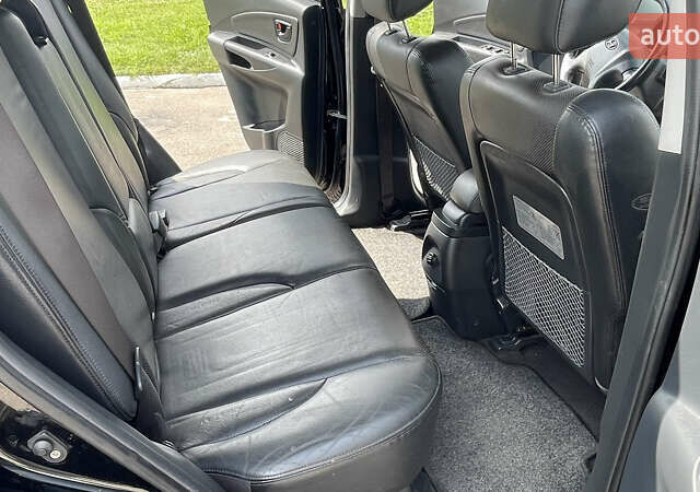 Черный Хендай Туксон, объемом двигателя 2 л и пробегом 236 тыс. км за 6950 $, фото 10 на Automoto.ua