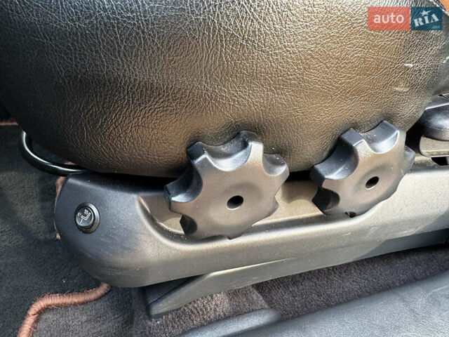 Черный Хендай Туксон, объемом двигателя 2 л и пробегом 210 тыс. км за 7990 $, фото 14 на Automoto.ua