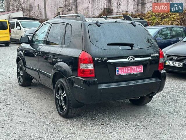 Чорний Хендай Туксон, об'ємом двигуна 2 л та пробігом 167 тис. км за 7950 $, фото 4 на Automoto.ua