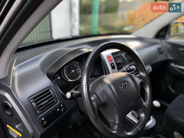 Чорний Хендай Туксон, об'ємом двигуна 1.98 л та пробігом 233 тис. км за 7650 $, фото 31 на Automoto.ua