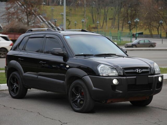 Черный Хендай Туксон, объемом двигателя 2.7 л и пробегом 217 тыс. км за 8600 $, фото 2 на Automoto.ua