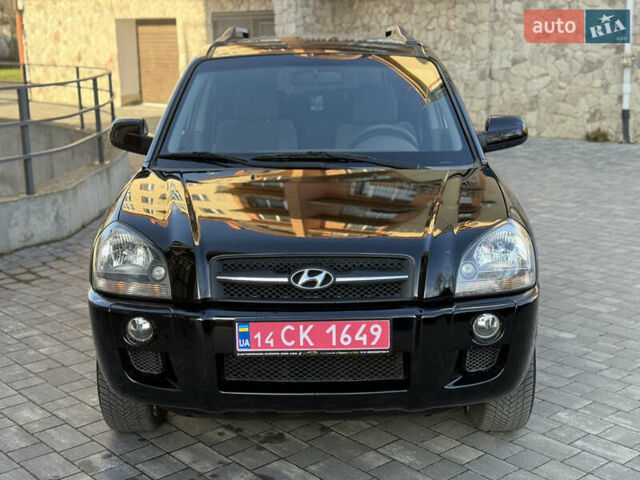 Черный Хендай Туксон, объемом двигателя 2 л и пробегом 249 тыс. км за 7450 $, фото 5 на Automoto.ua
