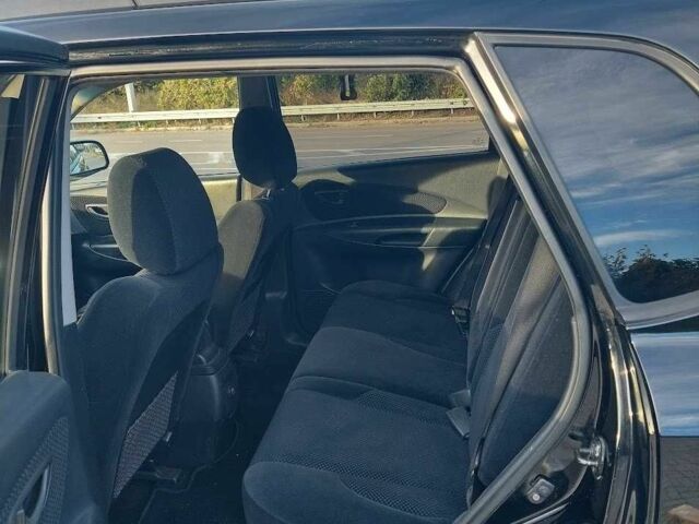 Чорний Хендай Туксон, об'ємом двигуна 2 л та пробігом 228 тис. км за 7800 $, фото 10 на Automoto.ua