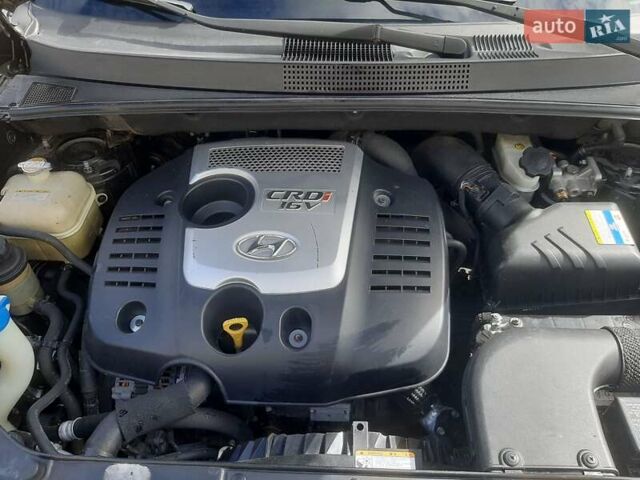 Черный Хендай Туксон, объемом двигателя 2 л и пробегом 280 тыс. км за 7400 $, фото 13 на Automoto.ua