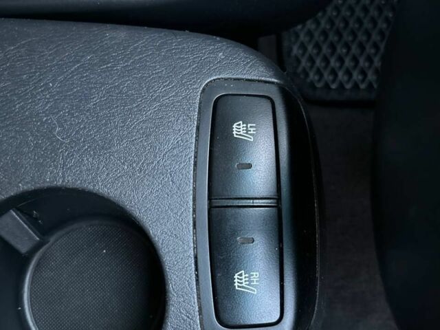 Чорний Хендай Туксон, об'ємом двигуна 2 л та пробігом 235 тис. км за 6700 $, фото 7 на Automoto.ua