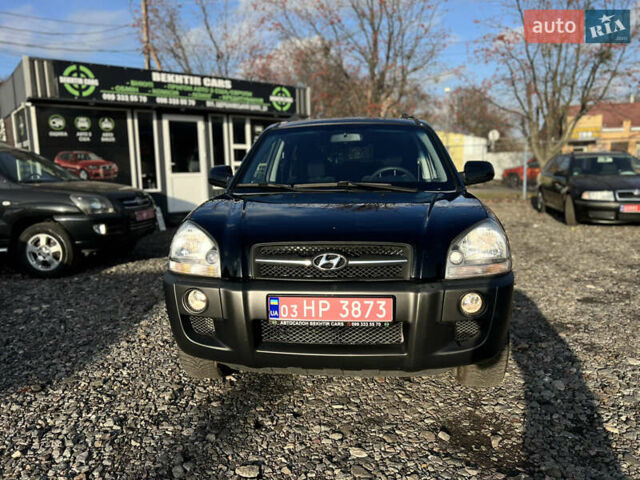 Черный Хендай Туксон, объемом двигателя 1.98 л и пробегом 191 тыс. км за 8300 $, фото 1 на Automoto.ua