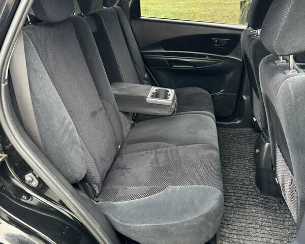 Черный Хендай Туксон, объемом двигателя 2 л и пробегом 201 тыс. км за 7750 $, фото 53 на Automoto.ua