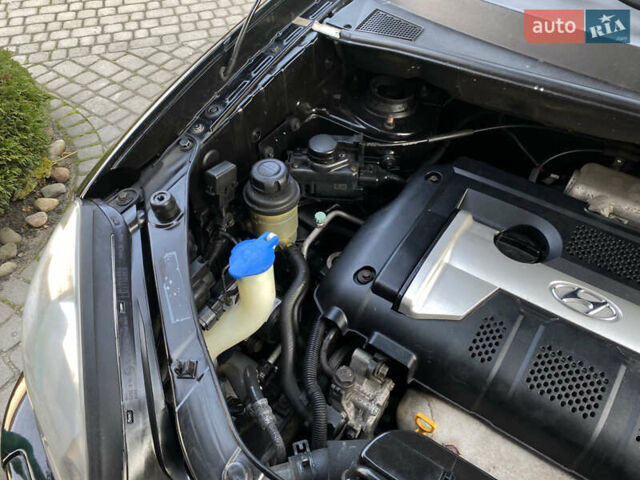 Чорний Хендай Туксон, об'ємом двигуна 1.98 л та пробігом 233 тис. км за 7650 $, фото 67 на Automoto.ua