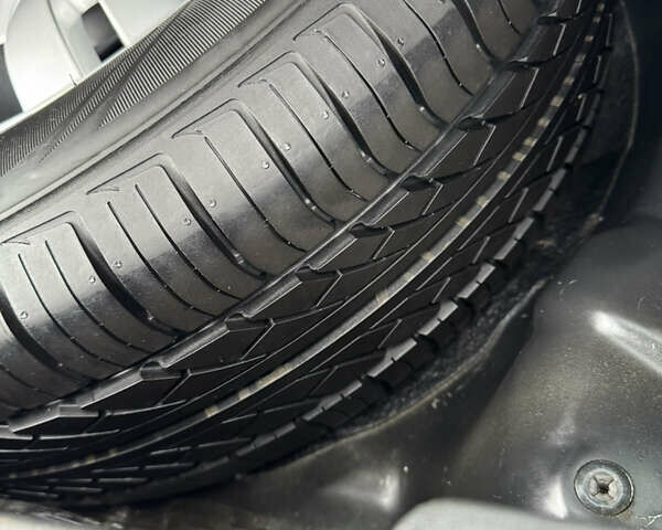 Черный Хендай Туксон, объемом двигателя 2 л и пробегом 201 тыс. км за 7750 $, фото 58 на Automoto.ua